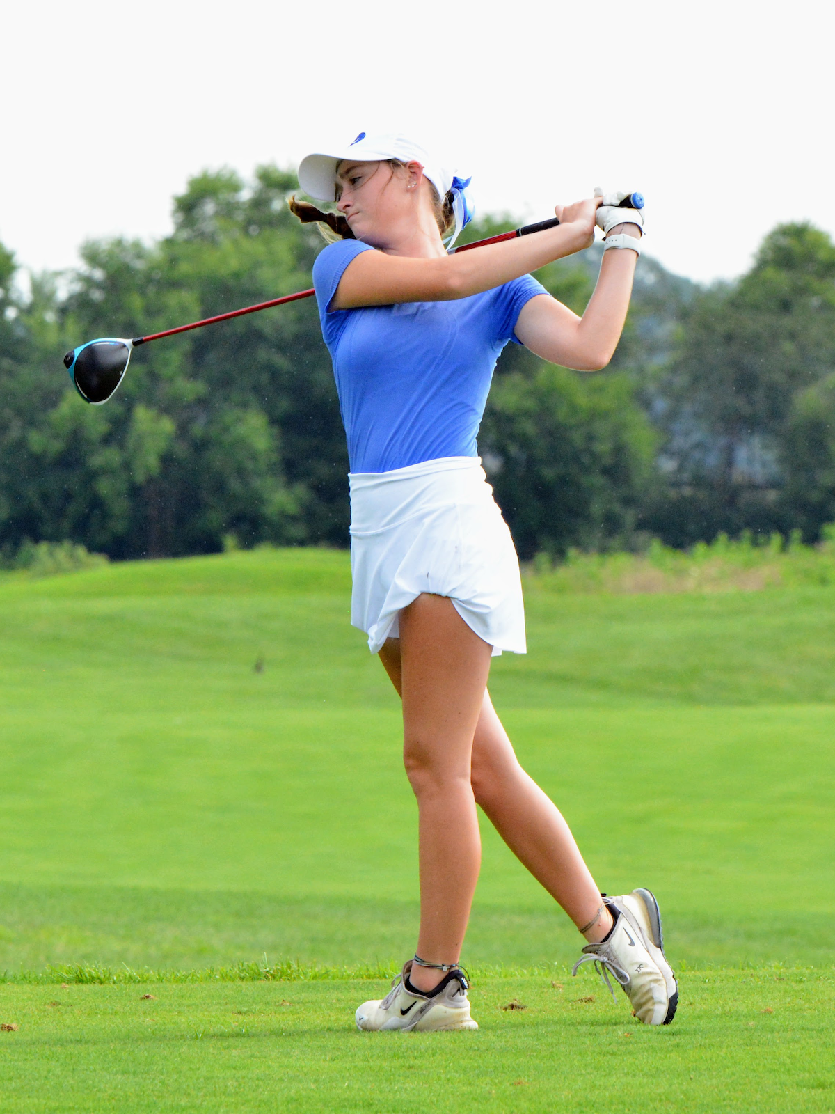 Dogs knock off Falcons in girls golf 177-229 cover photo