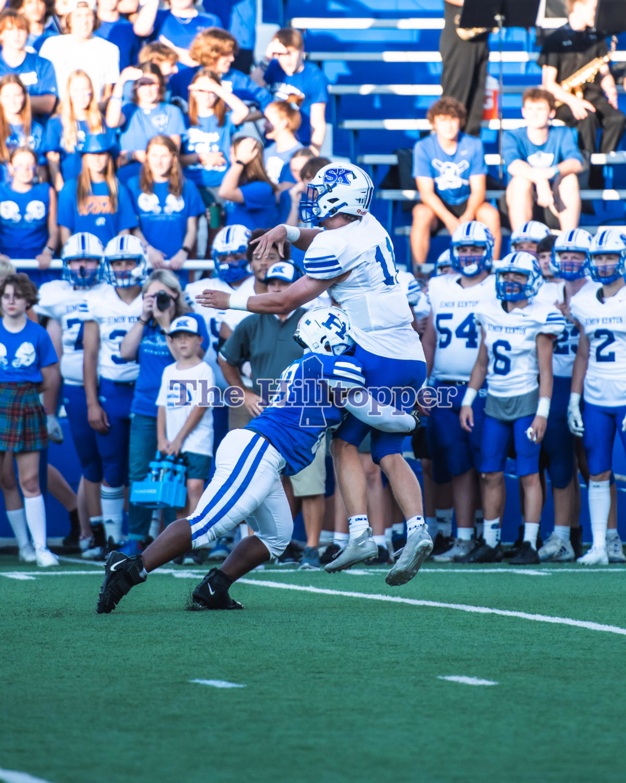 Senior-Trevaughn-Woods-takes-the-Simon-Kenton-quarterback-off-his-feet-in-the-midst-of-a-tackle.-.png