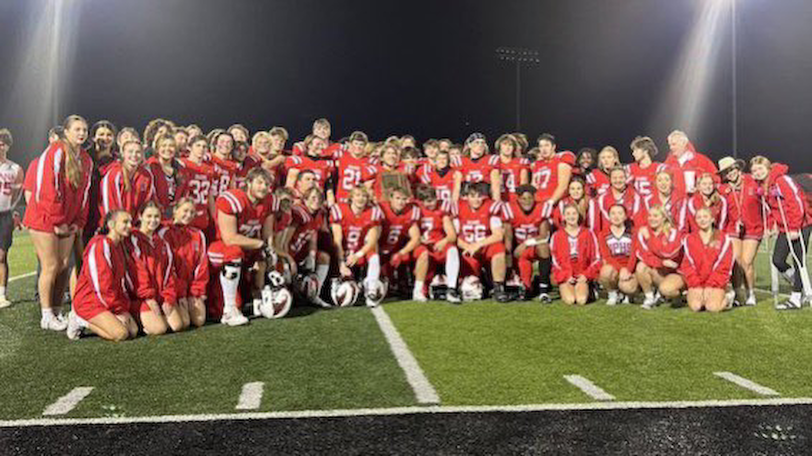 Football dominates Spartans, clinches sectional title cover photo