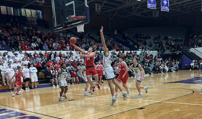 Boys basketball downs PH, advances to sectional final cover photo