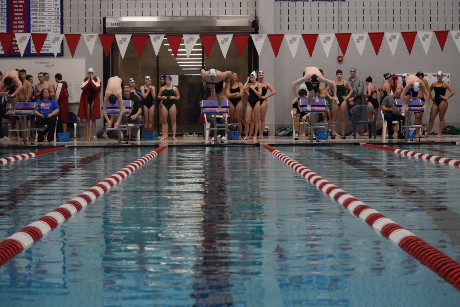 Stars split with Tigers in varsity swimming and diving cover photo