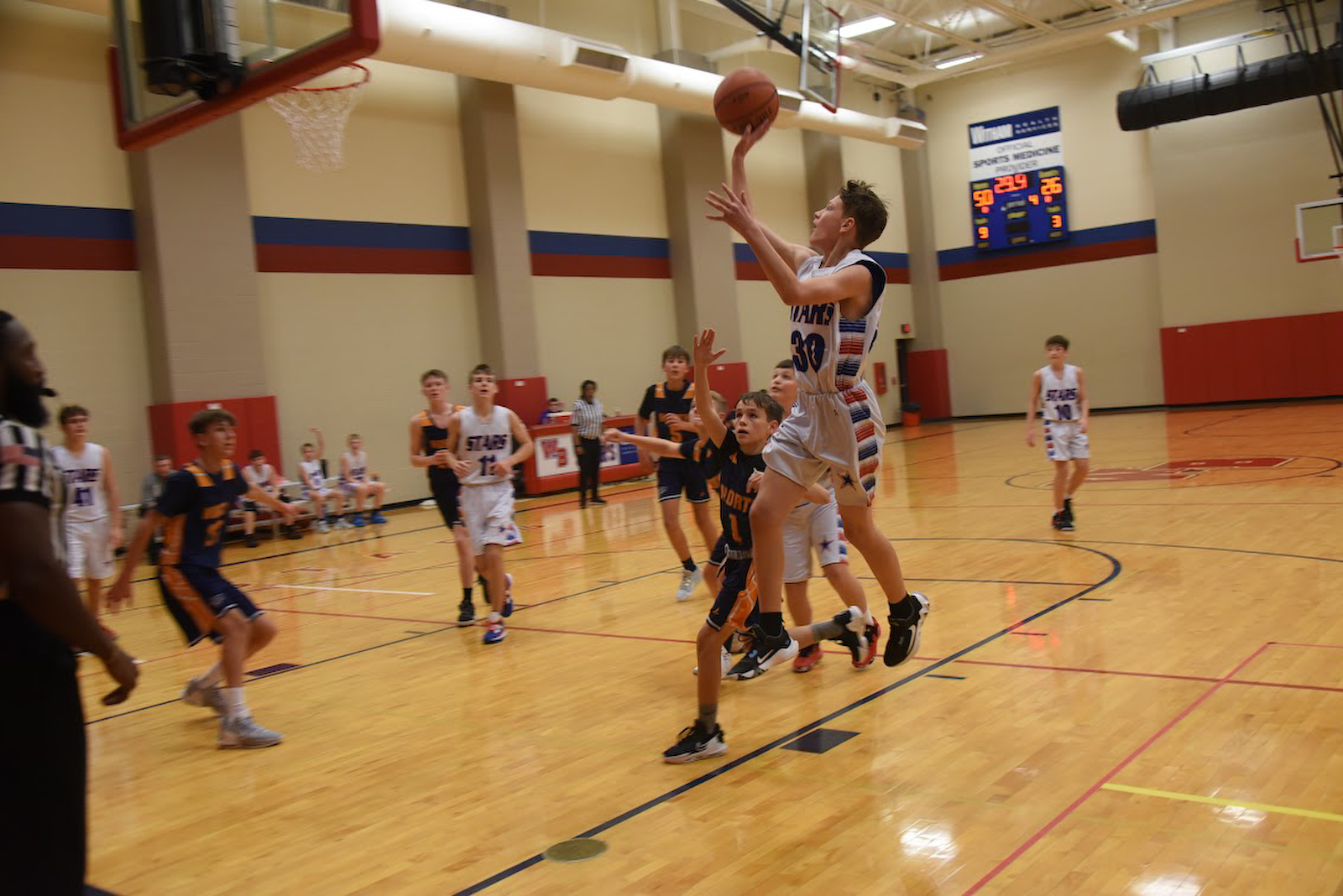 JH Stars sweep Chargers in boys basketball cover photo
